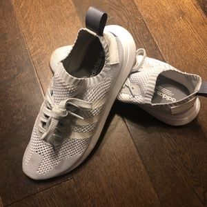 Greg ray and white adidas sock sneakers